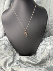 Gold Chain with Musical Diamond Pendant