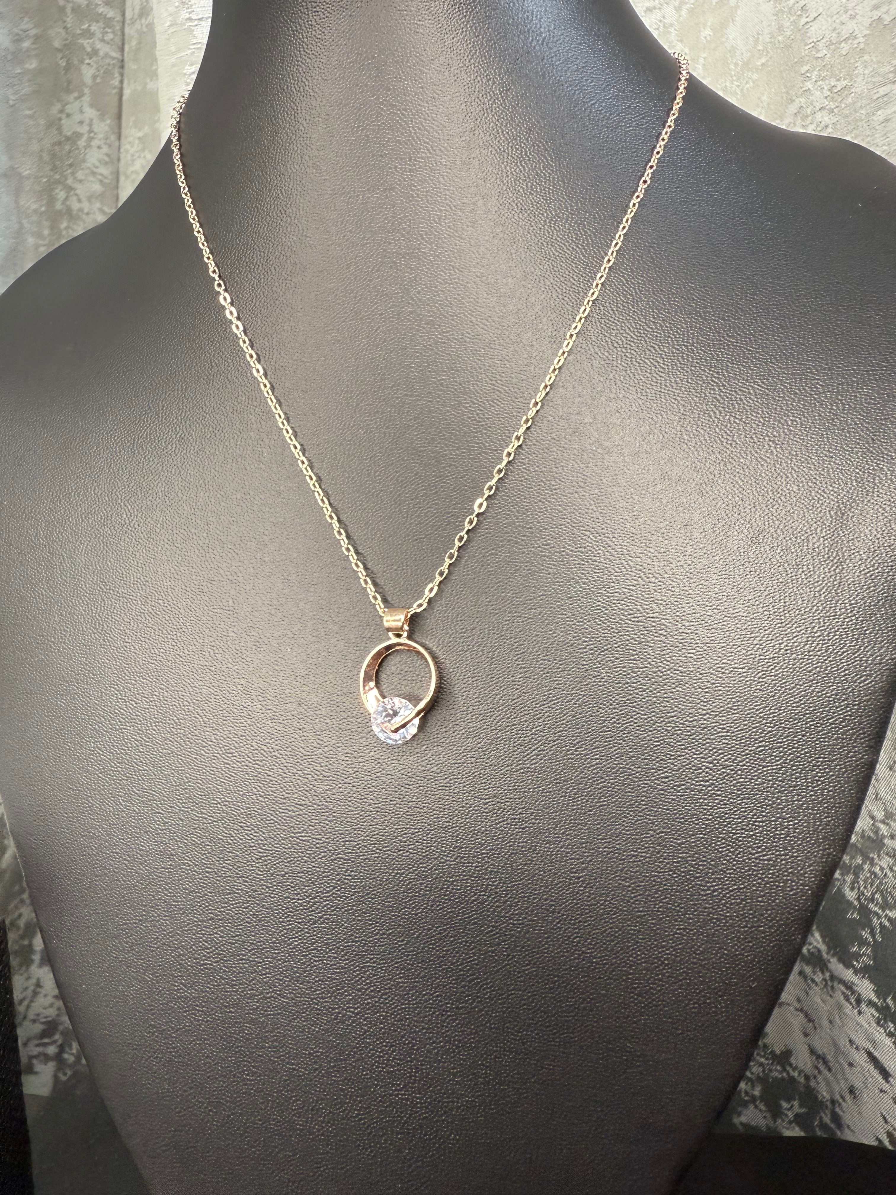 Gold Chain with Ring Pendant